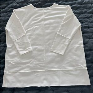 Super comfortable Spanx top. Oversized and the fabric has a lot of stretch.